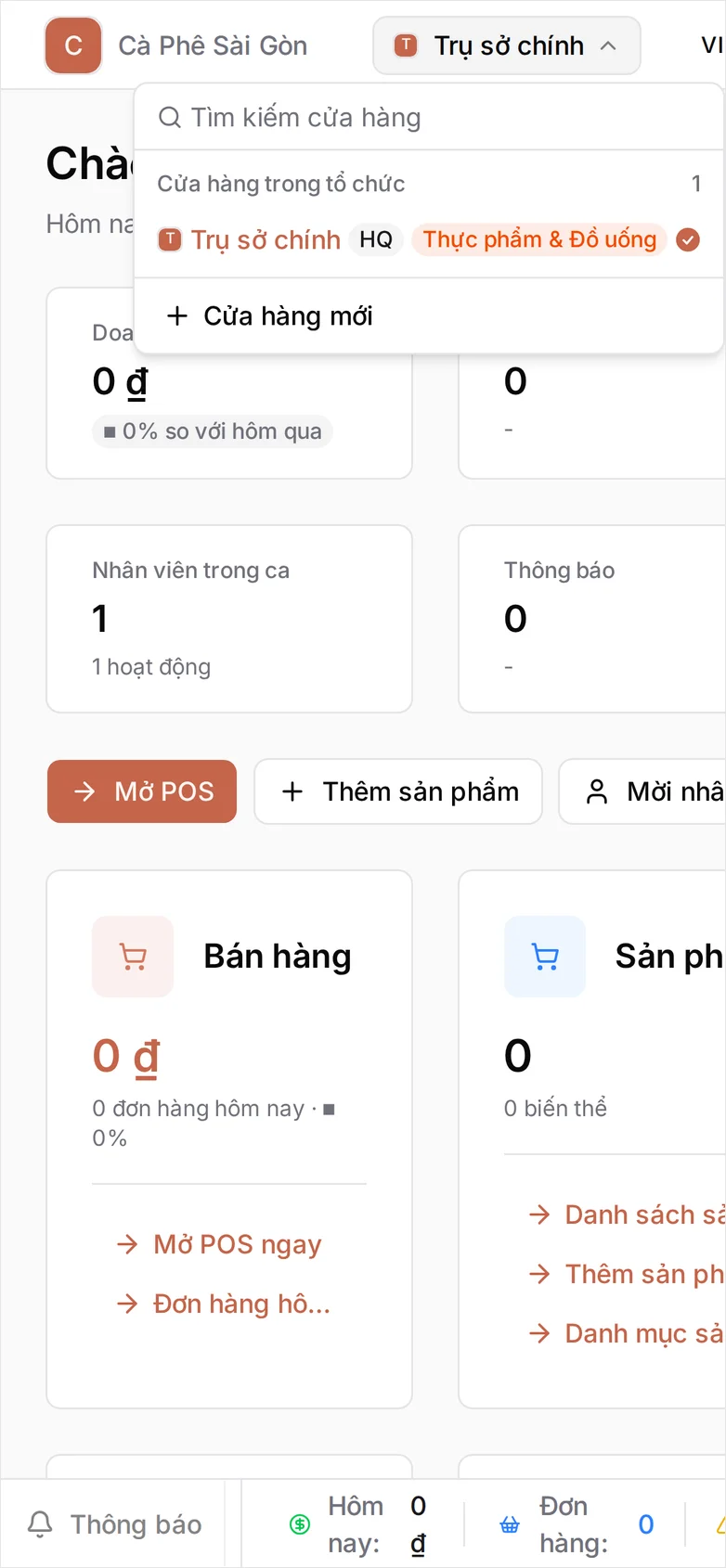 Menu cửa hàng đang mở phía trên bảng điều khiển, ngay dưới tên tổ chức Cà Phê Sài Gòn: ô Tìm kiếm cửa hàng, dòng tiêu đề 'Cửa hàng trong tổ chức' kèm số đếm 1, rồi Trụ sở chính mang nhãn HQ và nhãn Thực phẩm & Đồ uống cùng dấu tích cho biết đây là cửa hàng đang mở, và tùy chọn Cửa hàng mới bên dưới
