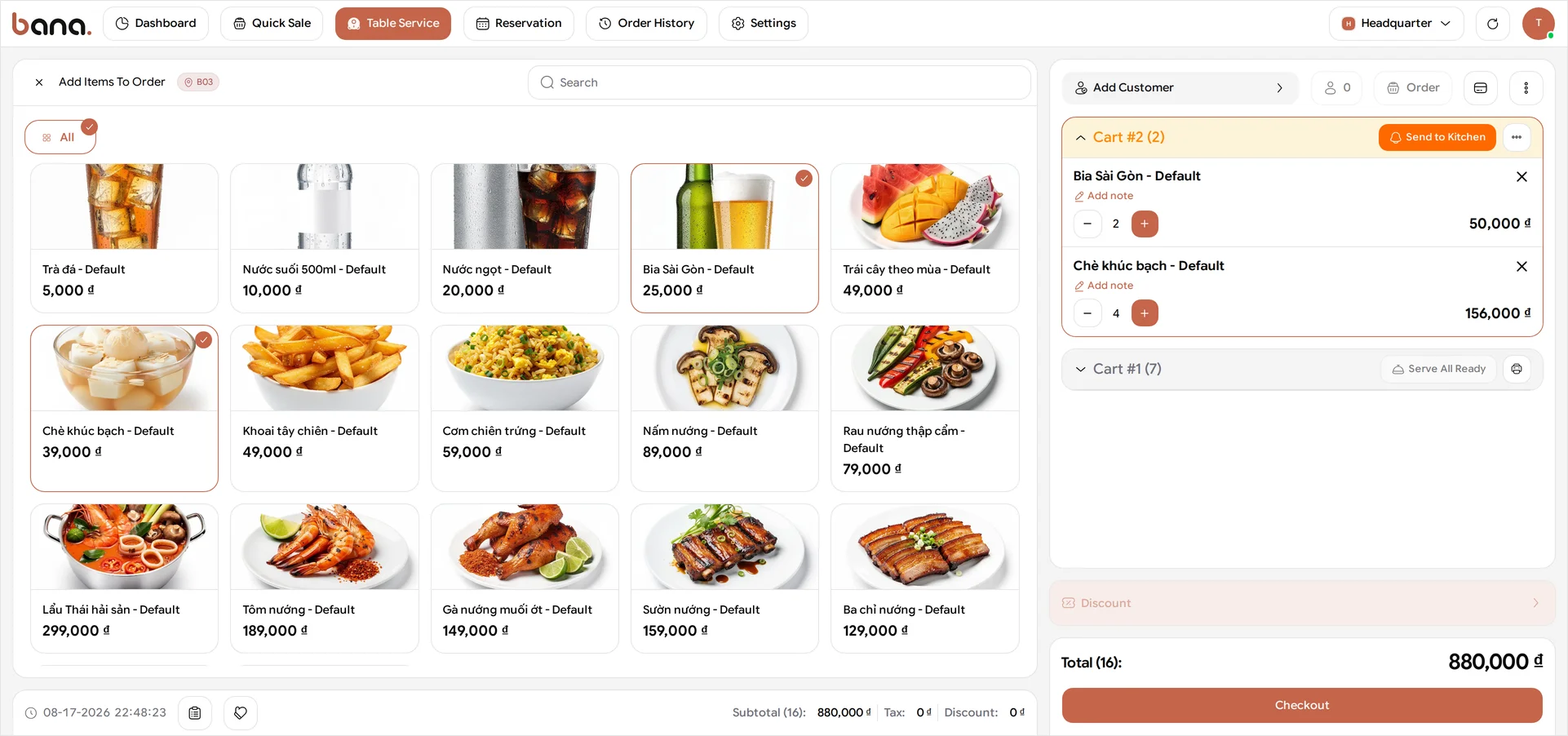 The order panel for table B03 in BANA Sale with two rounds stacked newest-first: Cart #2 on top, still open, with editable quantity steppers and its own Send to Kitchen button, and Cart #1 greyed out below it, its six dishes frozen to plain x1 chips and its beers to an x4 chip, beside a Serve All Ready button