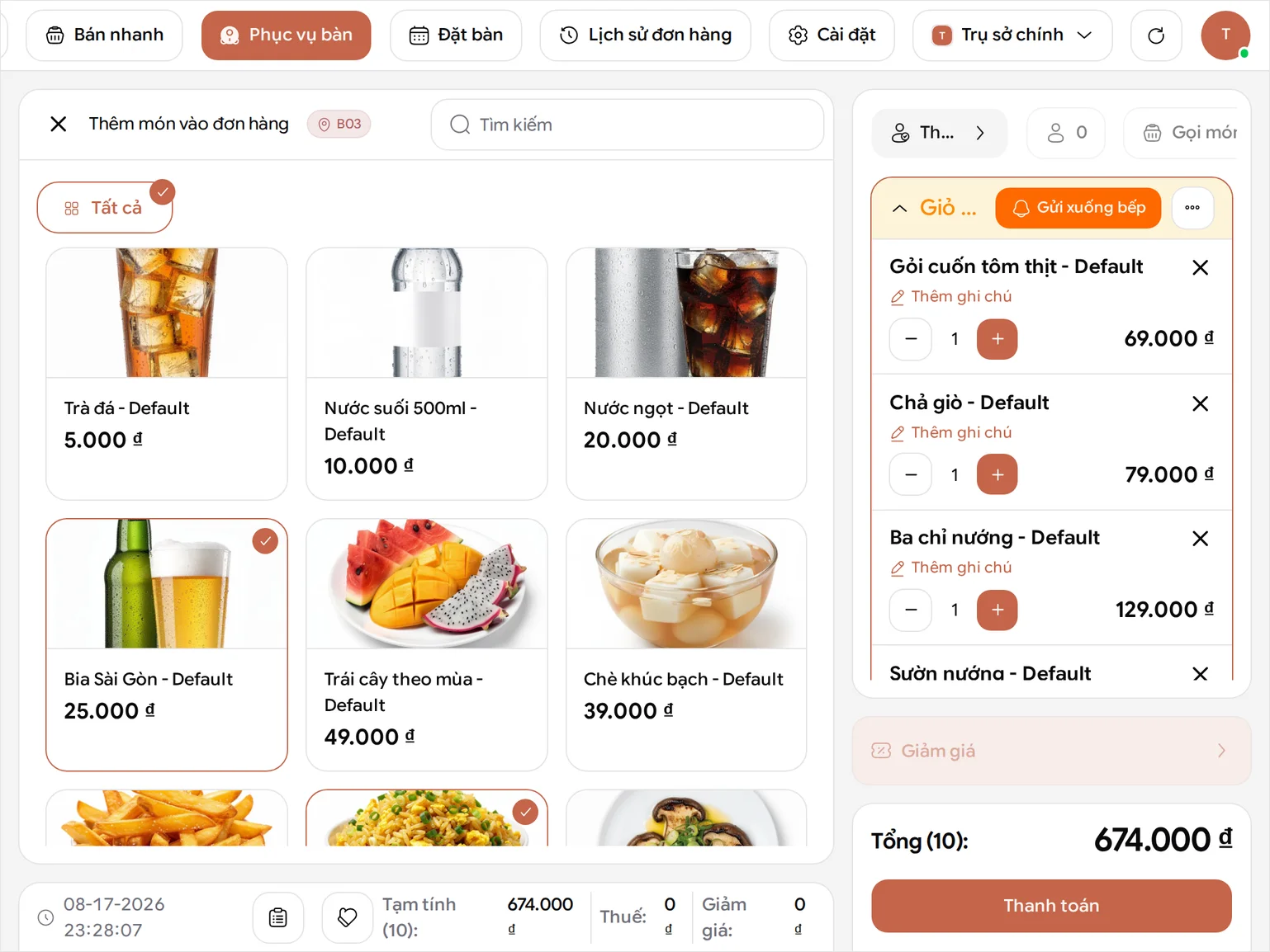 Màn hình thực đơn của bàn B03 trong BANA Sale với tiêu đề Add Items To Order, lưới món ăn bên trái và giỏ hàng là đợt đầu của bàn - Gỏi cuốn tôm thịt 69.000 ₫, Chả giò 79.000 ₫, Ba chỉ nướng 129.000 ₫, Sườn nướng 159.000 ₫, Rau nướng thập cẩm 79.000 ₫ và Cơm chiên trứng 59.000 ₫ mỗi thứ một phần, cùng 4 Bia Sài Gòn giá 25.000 ₫ mỗi chai thành 100.000 ₫ - tổng cộng Total (10) là 674.000 ₫ cùng nút Checkout